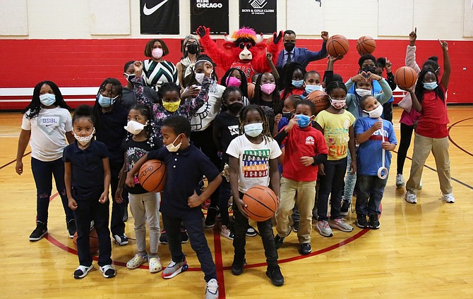 Benny the Bull poses with club representatives and students of the James R. Jordan Boys & Girls Club After School Program.   Photo cred:Freeman Pictures, Inc.):