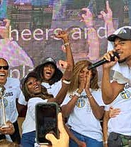 Chance the Rapper addressed the huge crowd of rally participants who full Millennium Park this past Tuesday October 19th, in celebration of the Sky's WNBA Championship.  Photo by Tia Carol Jones