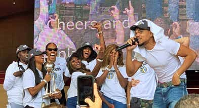 Chance the Rapper addressed the huge crowd of rally participants who full Millennium Park this past Tuesday October 19th, in celebration of the Sky's WNBA Championship.  Photo by Tia Carol Jones