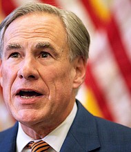 Texas Gov. Greg Abbott, photographed in June, announces an additional effort to arrest migrants under his already established Operation Lone Star, promising a surge of personnel and resources to combat what he called a crisis of human smuggling and drug smuggling at the border.
Mandatory Credit:	FILE/Montinique Monroe/Getty Images