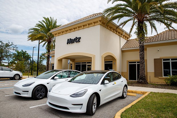 Tesla Model 3 electric vehicles at a Hertz location.
Mandatory Credit: Hertz