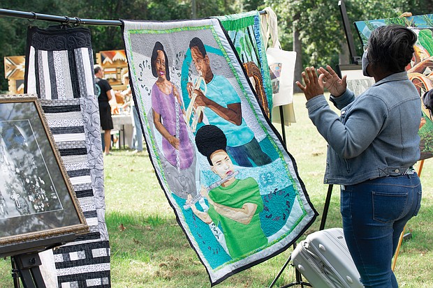 Quilt artist Unicia Buster, a former graphic designer with the Richmond Free Press, discusses the images and inspiration behind one of her quilts.