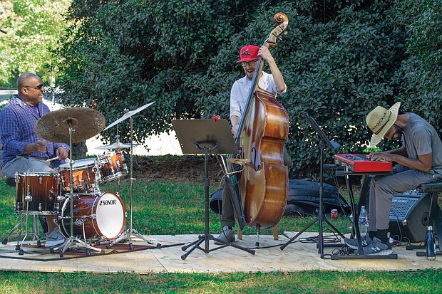 The Larri Branch Trio provides the jazz accompaniment setting the laid-back vibe at the event, where people enjoyed interactive workshops with artists and created pieces of their own.