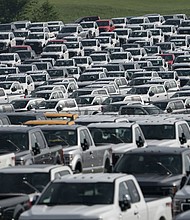 New Ford F-Series pickup trucks are stored in a lot during a semiconductor shortage at Kentucky Speedway in Sparta, Kentucky, U.S., on Friday, July 16, 2021.
Mandatory Credit:	 Jeffrey Scott Dean/Bloomberg/Getty Images