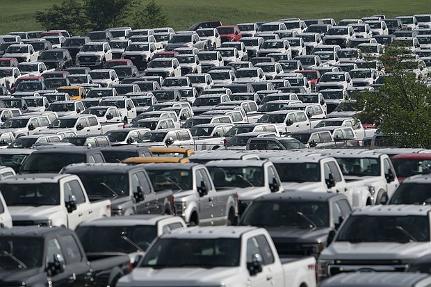 New Ford F-Series pickup trucks are stored in a lot during a semiconductor shortage at Kentucky Speedway in Sparta, Kentucky, U.S., on Friday, July 16, 2021.
Mandatory Credit:	 Jeffrey Scott Dean/Bloomberg/Getty Images