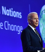 US President Joe Biden delivers a speech on stage during a meeting at the COP26 UN Climate Change Conference in Glasgow, Scotland, on November 1, 2021.
Mandatory Credit:	Brendan Smialowski/AFP/Getty Images