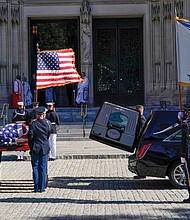 The flag-draped casket of former Gen. Colin Powell, a former head of the Joint Chiefs of Staff and U.S. secretary of state, is carried by a military honor guard into the Washington National Cathedral for a funeral service on Nov. 5.