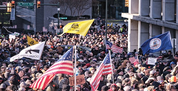 In this file photo from Jan. 20, 2020, thousands of demonstrators crowd Bank Street in Downtown, waving flags and signs during the Lobby Day rally by gun rights activists at the State Capitol on the Martin Luther King Jr. Holiday. Patrik Jordan Mathews and Brian Mark Lemley Jr. were sentenced Oct. 28 in federal court in connection with plans to commit violence at the rally.