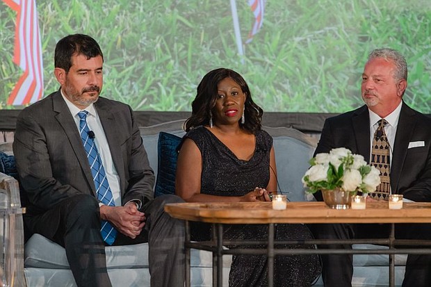 Paul Castro, Theresa Seck, and Chuck Cook