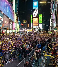 Revelers at Times Square during the New Year's Eve celebration on December 31, 2019 in New York City. People began celebrating New Year's Eve at Times Square in 1904, in 1907 the New Year's Eve Ball made its first descent from the flagpole at One Times Square.
Mandatory Credit:	David Dee Delgado/Getty Images