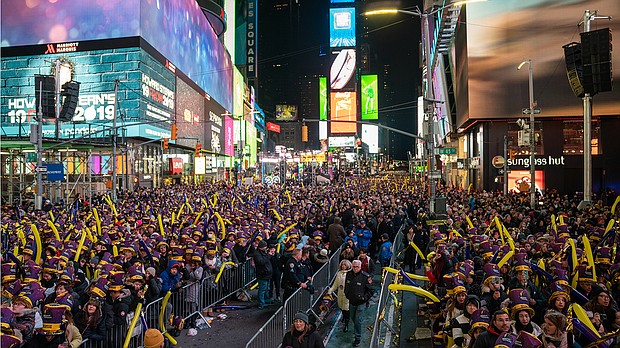 Revelers at Times Square during the New Year's Eve celebration on December 31, 2019 in New York City. People began celebrating New Year's Eve at Times Square in 1904, in 1907 the New Year's Eve Ball made its first descent from the flagpole at One Times Square.
Mandatory Credit:	David Dee Delgado/Getty Images