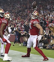 San Francisco 49ers tight end George Kittle celebrates after catching a touchdown against the Los Angeles Rams.
Mandatory Credit:	Jed Jacobsohn/AP