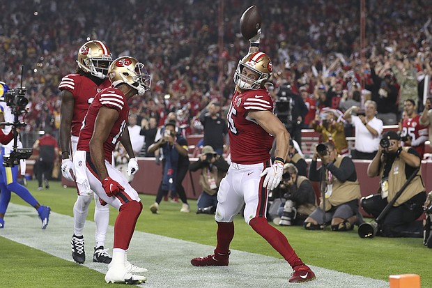 San Francisco 49ers tight end George Kittle celebrates after catching a touchdown against the Los Angeles Rams.
Mandatory Credit:	Jed Jacobsohn/AP