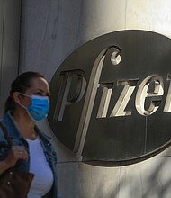 Pfizer said Tuesday it signed a licensing agreement to allow broader global access to its experimental Covid-19 pill.
Mandatory Credit:	KENA BETANCUR/AFP/AFP via Getty Images