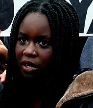 Nya Sigin attends a protest after a video of a racist rant was posted to social media.
Mandatory Credit:	WCCO