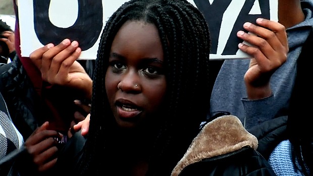 Nya Sigin attends a protest after a video of a racist rant was posted to social media.
Mandatory Credit: WCCO