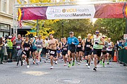 More than 14,000 runners participated in this year’s Richmond Marathon, which featured a full 26.2 mile marathon, a half marathon of 13.1 miles and an 8K race. Here, runners cross the starting line at 5th and Grace streets in Downtown last Saturday.