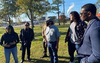 Regan hears from environmental justice advocates with the group TEJAS in Baytown’s Unidad Park.