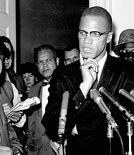 Malcolm X speaks to reporters on May 16, 1963, in Washington, D.C.