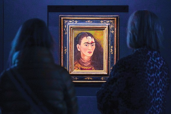 NEW YORK A Frida Kahlo self-portrait that shows the artist with the face of her husband, Diego Rivera, in the ...
