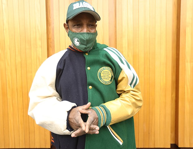 Howard Hopkins, former coach, teacher and principal with Richmond Public Schools, shows off his
athletic jacket with the colors of both Armstrong High School and Maggie L. Walker High School that he said is a “representation of unity.” Mr. Hopkins is on the organizing committee of the Armstrong-Walker Classic Legacy parade and football game that is taking place Saturday, Nov. 27.