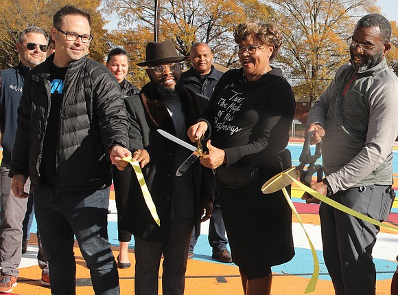 Call it Sharmar “Simba” Hill Jr.’s new house. Last Saturday, a huge, colorful basketball court was dedicated in honor of ...