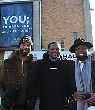 Former Chicago Bears Players Matt Forte and Anthony Adams, with The Reverend Charlie Dates, Pastor of Progressive Baptist Church, during the What’s Your Forte Foundation’s Thanksgiving Giveaway.