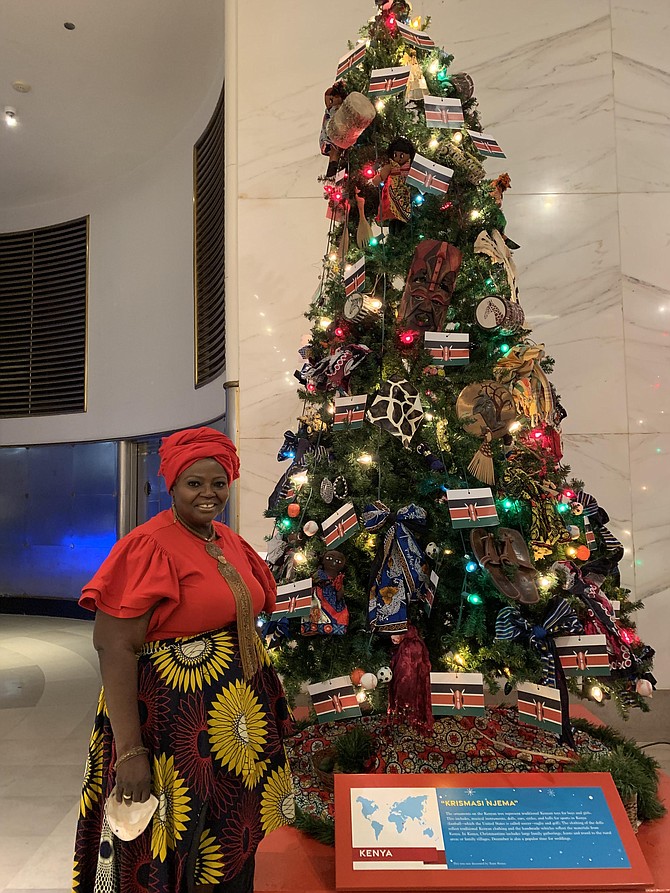 Sheila Wesonga, along with African Americans and Kenyans, decorated the Kenyan tree for the Museum of Science and Industry’s Christmas Around the World and Holidays of Light display.