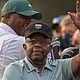 A file photo from AP shows Lee Elder at the Masters golf tournament in Augustanta, Ga on April 8.. Elder broke down racial barriers as the first Black golfer to play in the Masters and paved the way for Tiger Woods and others to follow.