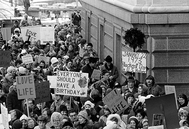 The justices are gathering to consider whether Roe v. Wade should be overturned, and pictured, an estimated 5,000 people march around the Minnesota Capitol building protesting the U.S. Supreme Court's Roe v. Wade decision, in St. Paul, Minn., Jan. 22, 1973.
Mandatory Credit:	AP/FILE