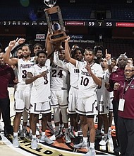 The Virginia Union University Panthers celebrate their victory over Winston-Salem State University on Nov. 23 in the final of the Chris Paul HBCU Tip-Off at the Mohegan Sun Arena in Connecticut.