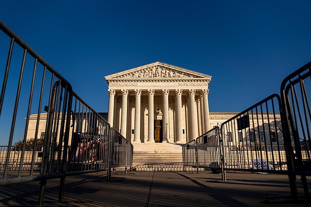 When the Supreme Court hears a constitutional challenge to a Mississippi ban on abortion after 15 weeks of pregnancy, the justices will start with the two seminal decisions that secured the abortion right for women, and pictured, the Supreme Court building in Washington on November 30.
Mandatory Credit:	Andrew Harnik/AP