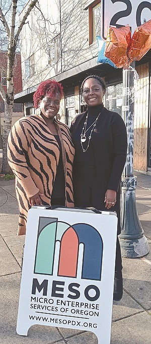 Jataune Hall (left) and Ahquoya Brooks of Micro Enterprise Services of Oregon (MESO), introduce the community to a special MESO holiday market for gift buying during the holidays featuring goods from minority-owned firms, supporting vendors of color, located at 1237 N.E. Alberta St.