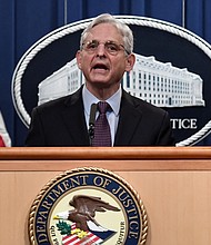 The Justice Department filed a lawsuit challenging legislative maps adopted by Texas Republicans in recent weeks, and pictured, 
Attorney General Merrick B. Garland speaks during a press conference at the Department of Justice in Washington, DC on November 8.
Mandatory Credit:	OLIVIER DOULIERY/AFP/Getty Images
