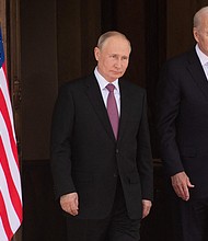 President Joe Biden will hold a call with Russian President Vladimir Putin, pictured here, in Geneva on June 16, in what is expected to be a highly consequential meeting for the two leaders amid escalating tensions between Russia and Ukraine.
Mandatory Credit:	SAUL LOEB/AFP/POOL/Getty Images