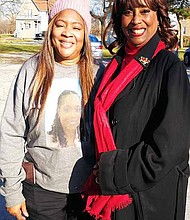 State Rep. Debbie Myers-Martin is picture with a Supporter of the BJ McCoy-Thomas Initiative.  The BJ McCoy Initiative supports needed families by provided food and coat drives.  Photo provided by Algernon H. Penn