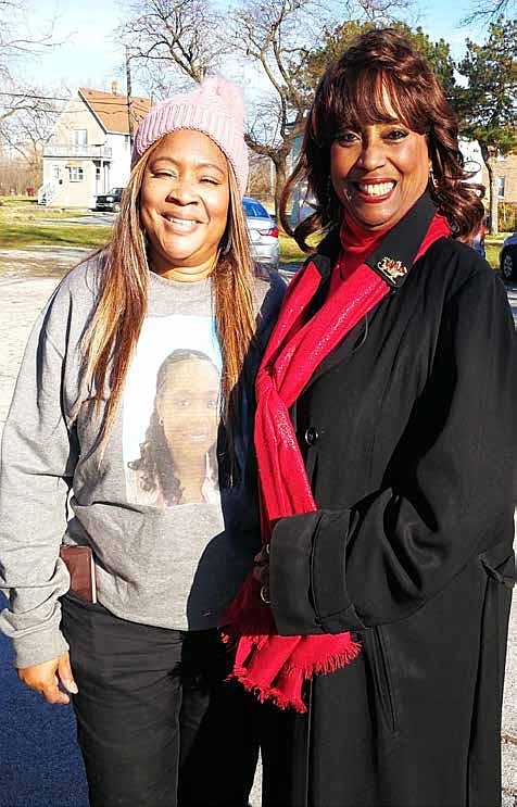 State Rep. Debbie Myers-Martin is picture with a Supporter of the BJ McCoy-Thomas Initiative.  The BJ McCoy Initiative supports needed families by provided food and coat drives.  Photo provided by Algernon H. Penn