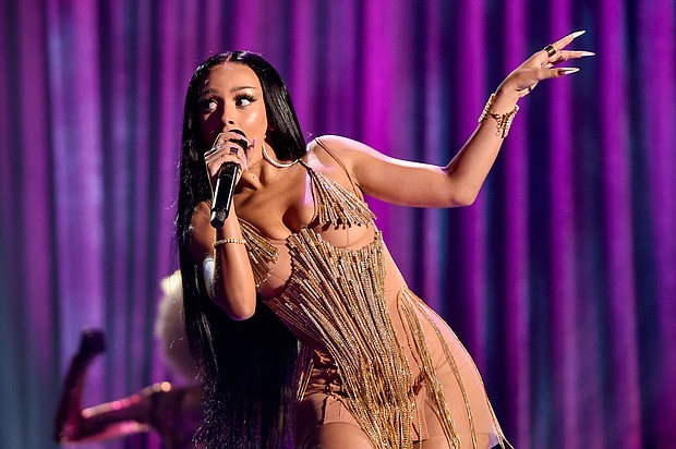 Doja Cat, pictured on, December 31, 2020 and January 1, has announced she's dropped out of the 2021 iHeartRadio Jingle Ball Tour after testing positive for Covid-19.
Mandatory Credit:	Alberto E. Rodriguez/Getty Images North America/Getty Images for dick clark prod