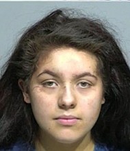 Lydia Carmona-Cartagena, 23, is accused of killing 41-year-old Chad Wilson by stabbing and running him over with a car repeatedly.
Mandatory Credit:	Milwaukee Police Department/WDJT