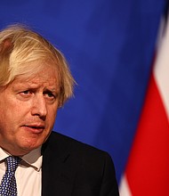 British Prime Minister Boris Johnson announces that the government will implement its "Plan B" Covid measures due to the rapid transmission of the Omicron variant.
Mandatory Credit:	Adrian Dennis/WPA/Pool/Getty Images