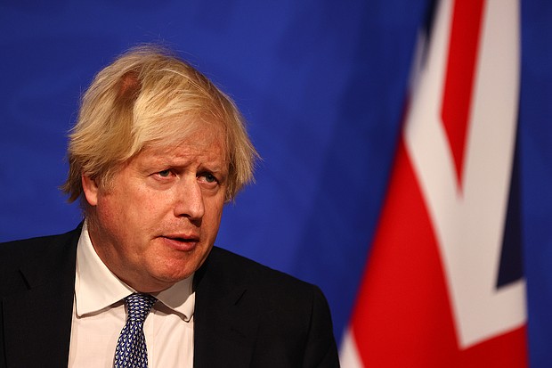British Prime Minister Boris Johnson announces that the government will implement its "Plan B" Covid measures due to the rapid transmission of the Omicron variant.
Mandatory Credit: Adrian Dennis/WPA/Pool/Getty Images