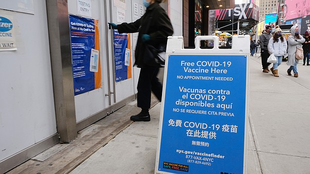A COVID-19 vaccination pop-up site stands in Times Square on December 9 in New York City.
Mandatory Credit:	Spencer Platt/Getty Images