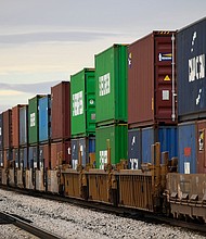 A freight train carries cargo shipping containers in the El Paso Sector along the US-Mexico border between New Mexico and Chihuahua state on December 9 in Sunland Park, New Mexico.
Mandatory Credit:	Patrick T. Fallon/AFP/Getty Images