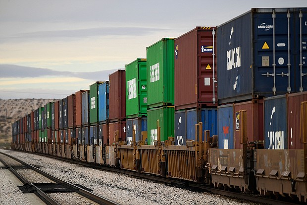 A freight train carries cargo shipping containers in the El Paso Sector along the US-Mexico border between New Mexico and Chihuahua state on December 9 in Sunland Park, New Mexico.
Mandatory Credit:	Patrick T. Fallon/AFP/Getty Images