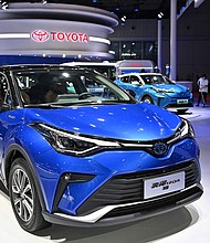 A Toyota IZOA electric car is seen during the 19th Shanghai International Automobile Industry Exhibition in Shanghai on April 19.
Mandatory Credit:	HECTOR RETAMAL/AFP/Getty Images