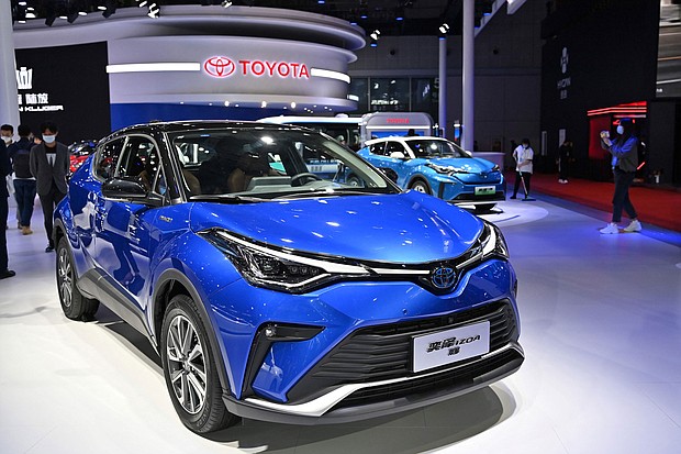 A Toyota IZOA electric car is seen during the 19th Shanghai International Automobile Industry Exhibition in Shanghai on April 19.
Mandatory Credit:	HECTOR RETAMAL/AFP/Getty Images
