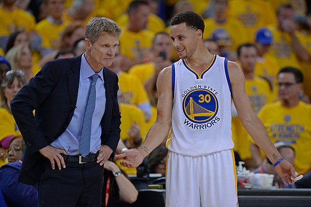 Curry chatting with Warriors coach Steve Kerr in the 2015 NBA Playoffs.
Mandatory Credit: Jose Carlos Fajardo/Bay Area News Group/Getty Images