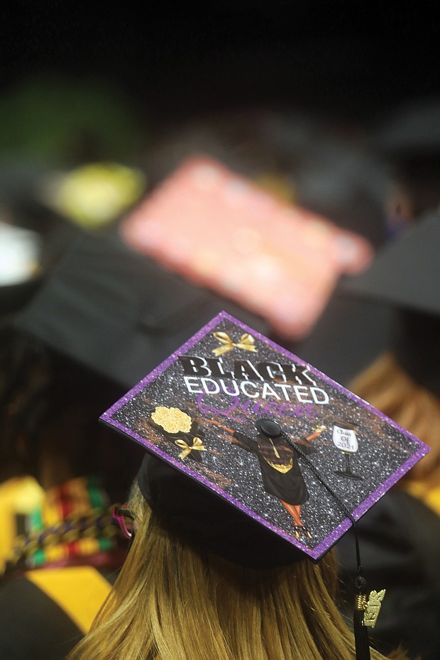 Many graduates decorated their mortar boards with messages to family and about the future.