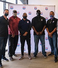 Several former NFL players met and signed autographs for Richmond area fans last Saturday during an event to encourage people to get vaccinated against COVID-19 held at the Bon Secours Training Center. Attending the event are, from left, Kyle Richardson, former punter for the Baltimore Ravens and NFL Alumni lead ambassador; Ravin Caldwell, former Washington Football Team linebacker and two-time Super Bowl champion; Radford native Gary Clark, former Washington wide receiver and two-time Super Bowl champion; Riddick Parker, Seattle Seahawks defensive tackle; Richmond native Ken Oxendine, a former Thomas Dale High School standout and Atlanta Falcons running back and vice president of the NFL Alumni Richmond chapter; and Richmond native Dion Foxx, a former Meadowbrook High School standout, former linebacker for Washington, the Miami Dolphins and the Green Bay Packers and president of the NFL Alumni Richmond chapter. The event was sponsored by NFL Alumni Health, in partnership with the federal Centers for Disease Control and Prevention, the Richmond and Henrico health districts and Bon Secours.