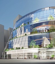 This is an artist's rendering of a renovated John R. Thompson Center at 100 W. Randolph St. in Chicago. JRTC Holdings has been identified as a potential buyer of the state-owned building. The closing date will be in the summer of 2022 followed by two years of renovations.